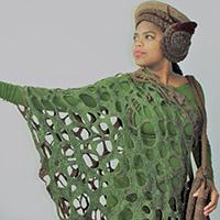 Groene opengewerkte jurk + bruine accessoires